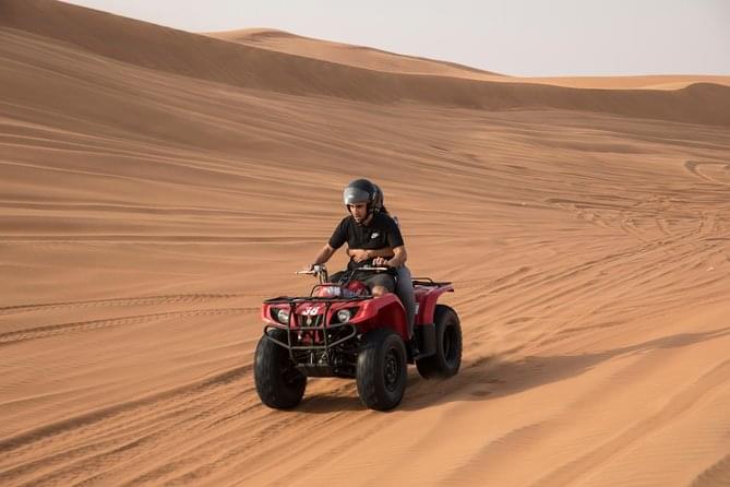 Race through the golden sands on a powerful quad bike during an adrenaline-pumping quad biking session