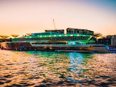 Board the lavish Mega Yacht Dinner Cruise to see numerous Dubai attraction points