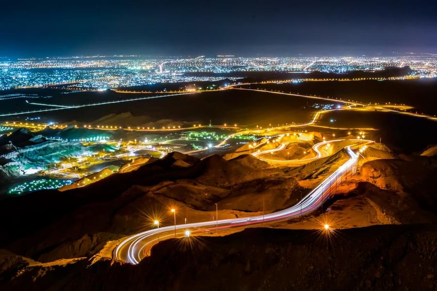 Experience the Enchanting Beauty of Al Ain by Night - A Spectacular Sight to Behold
