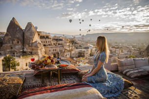Girl enjoying the stunning view of Cappadocia, Turkey