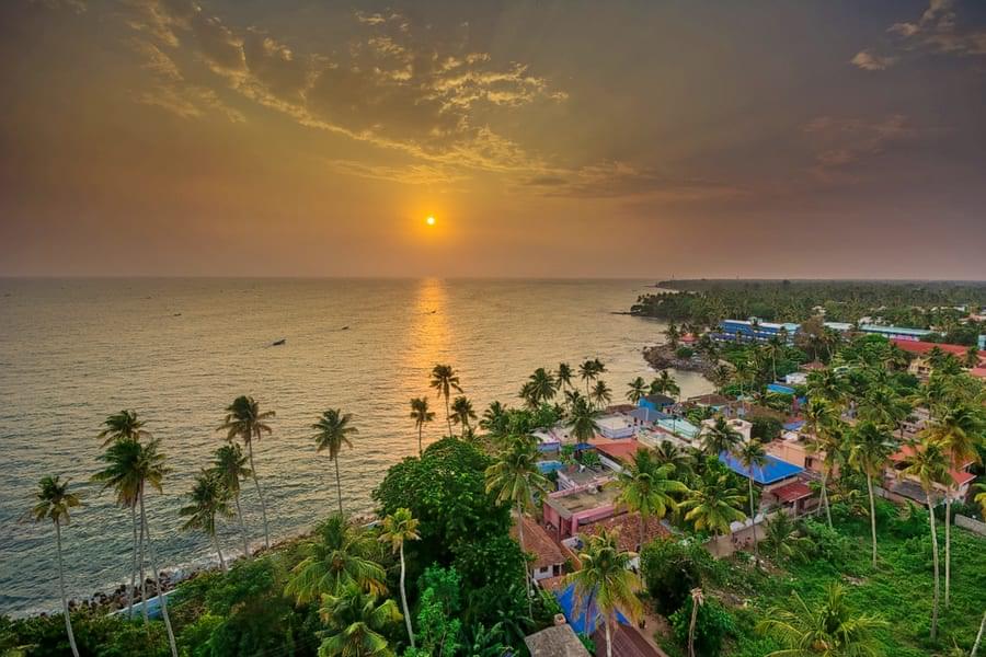 Admire the panoramic sunset views from Thangassery Lighthouse