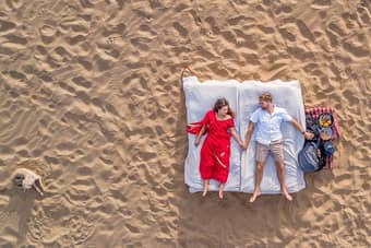 Enjoy a unique stay experience on a traditional Rajasthani charpai on the dunes