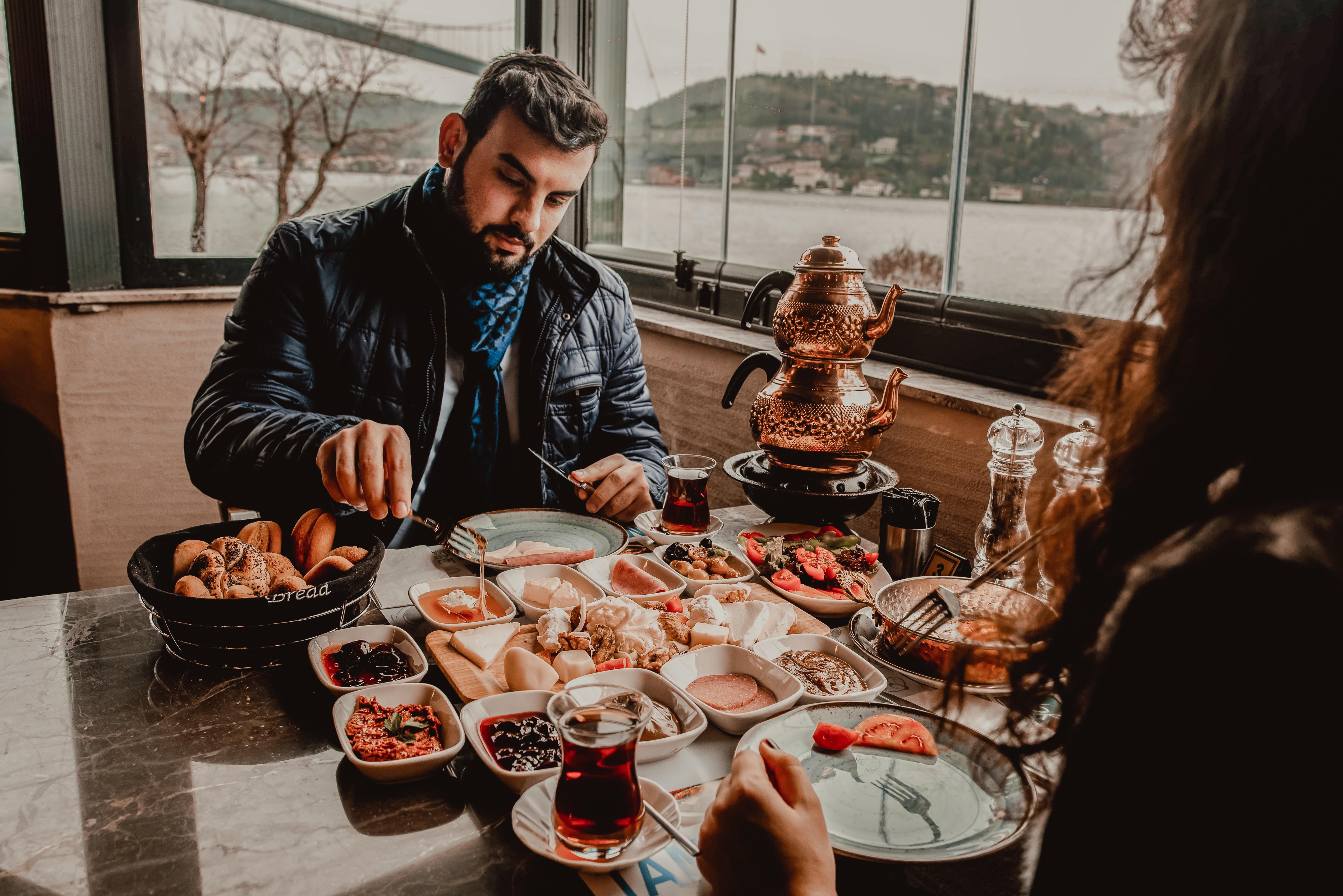 A man Eating in a Cafe near Hagia Sophia