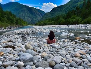 Woman meditating in Rishikesh