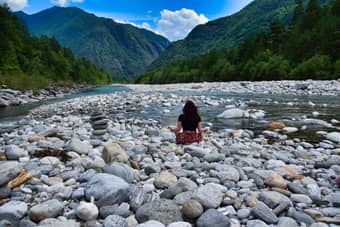 Woman meditating in Rishikesh