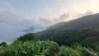 Feel the fresh mist while hiking toward the falls