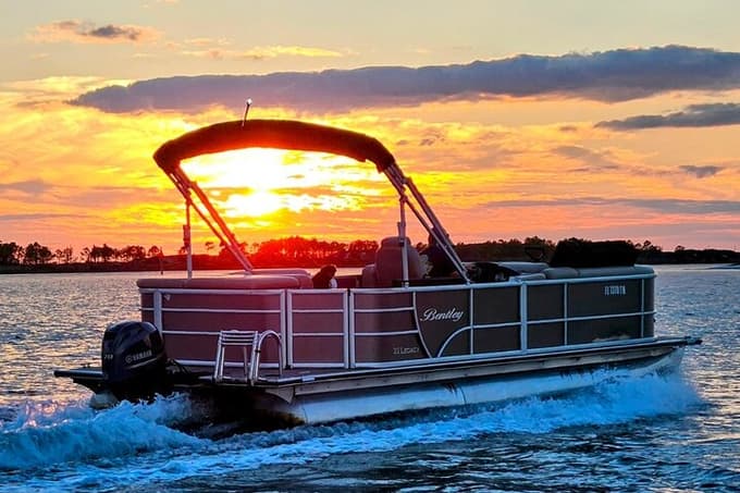 Catch golden hour views from a peaceful pontoon ride
