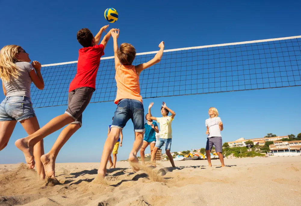 Play volleyball
