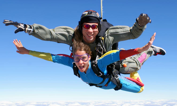 Get the utmost thrilling experience with Tandem Skydiving