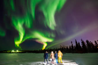 Tourist enjoying Northern Lights