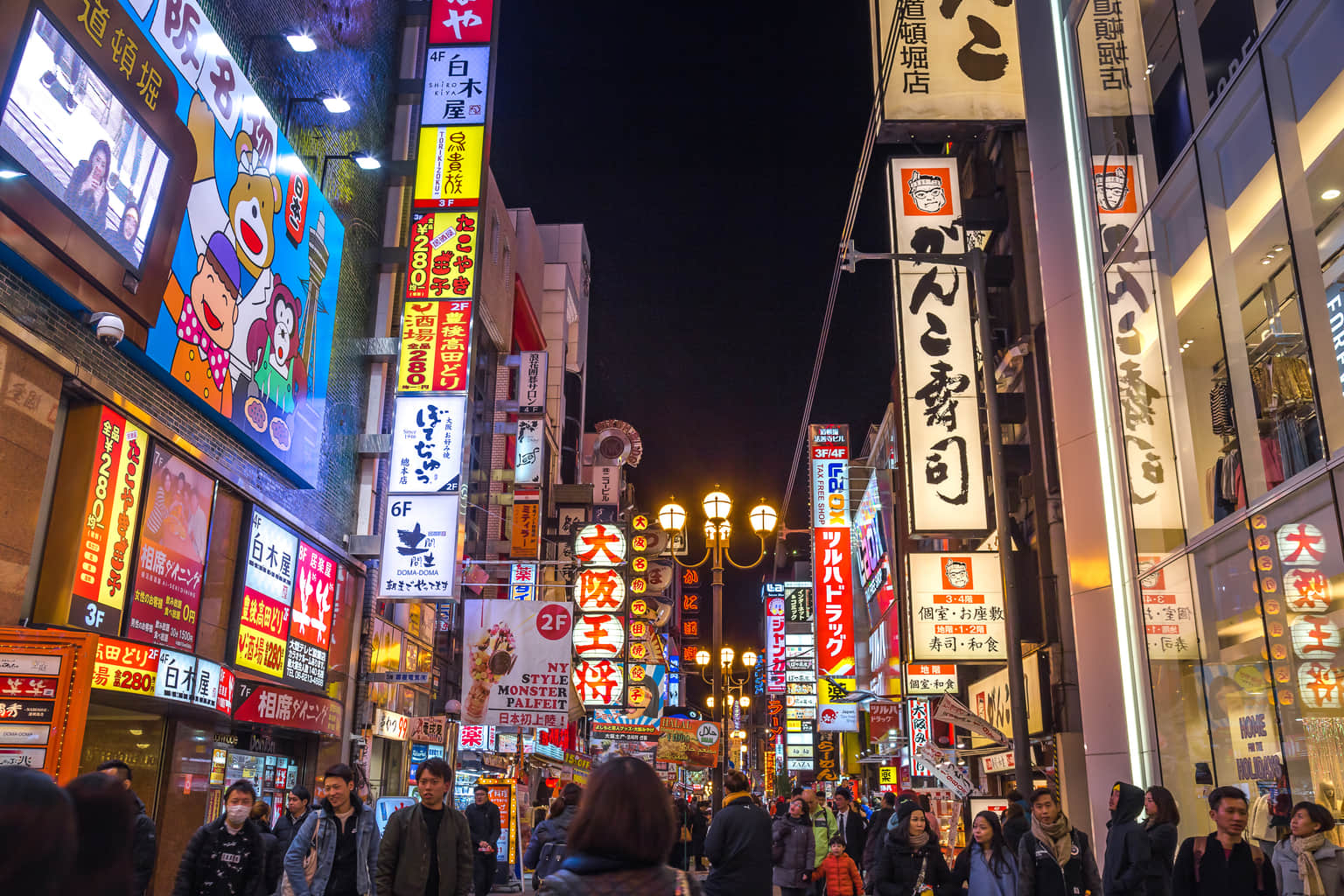 Bustling Dotonbori Street in Osaka, a must-visit in Japan tour packages.