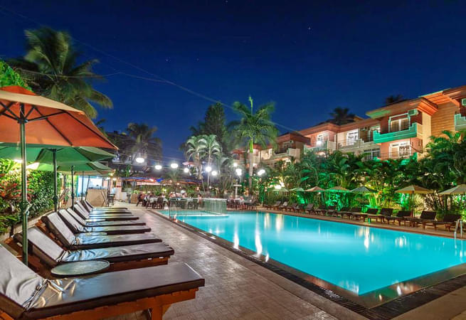 Pool View at night of SoMy resort in Goa