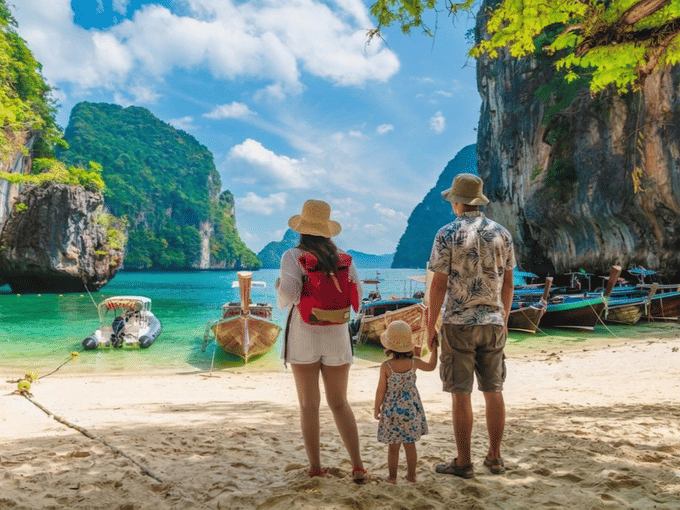 Family enjoying beach time at Phi Phi Islands shoreline