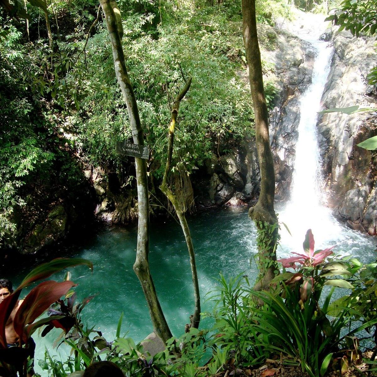 Explore the Kroya Waterfall’s natural pool