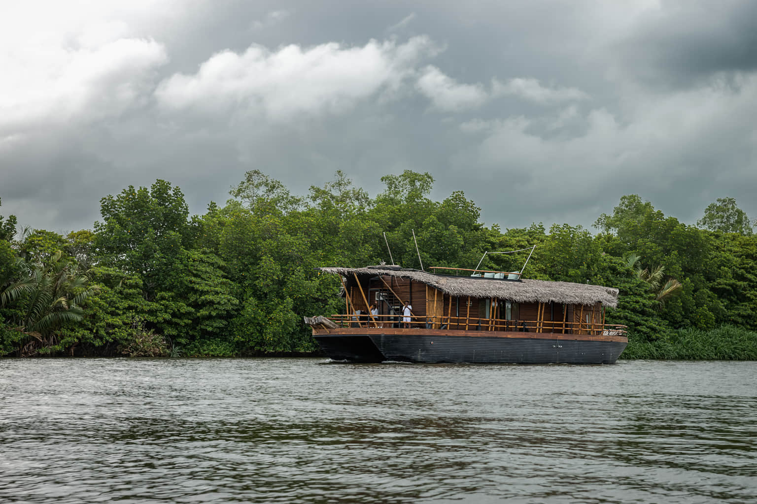Charming hut boat floating on serene waters during a Sri Lanka trip