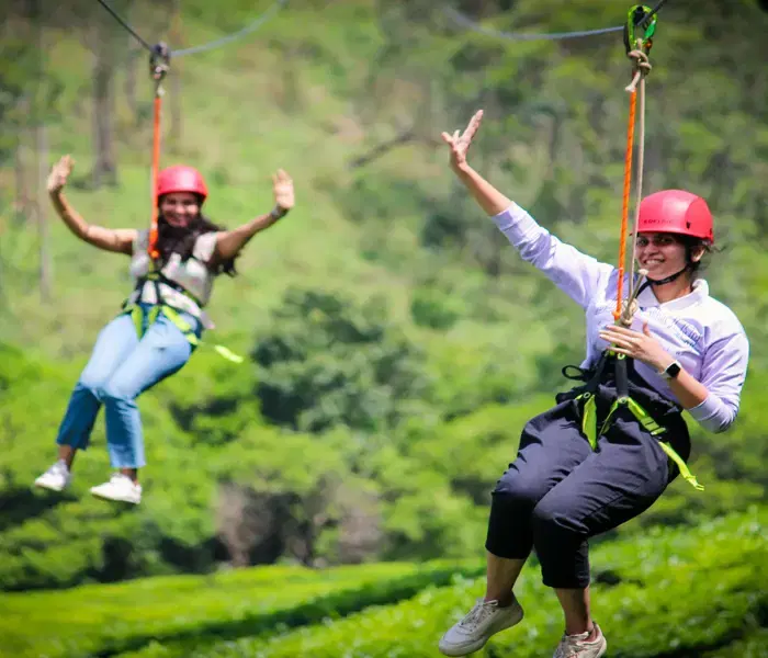 Visitors enjoying Ziplining activity in Munnar