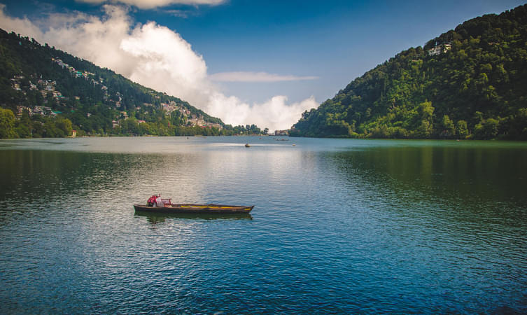 Enjoy a peaceful boat ride in the Naini Lake