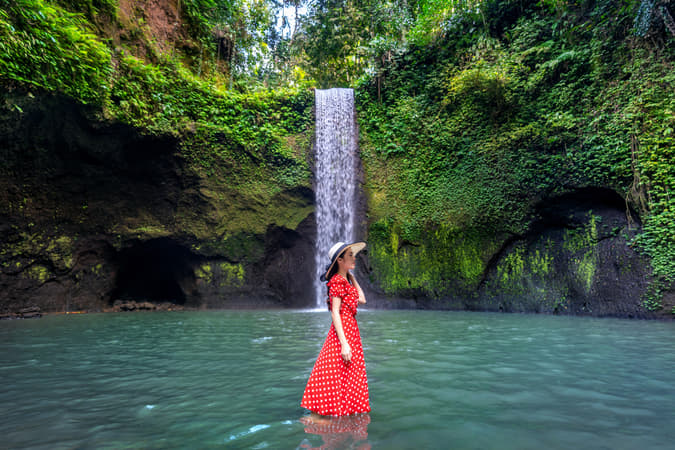 Spend some time in the serene environment of Tibumana Waterfall
