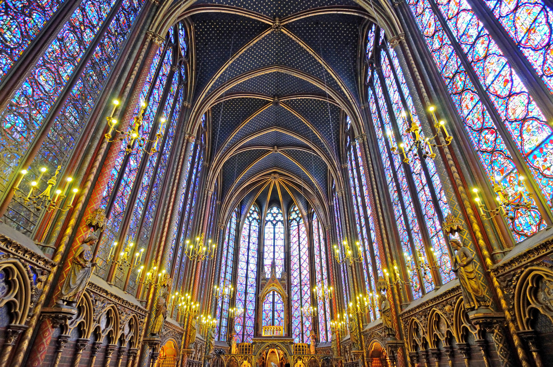 Get astonished by the iconic stained glass windows of the chapel