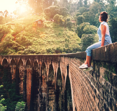 Visitor at the stunning Nine Arch Bridge
