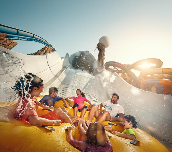 Live the adrenaline rush on the world's longest mammoth six-seater water coaster in Yas Waterworld