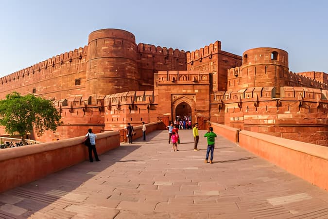 Step into history as you explore the grand halls of Agra Fort, once home to Mughal emperors