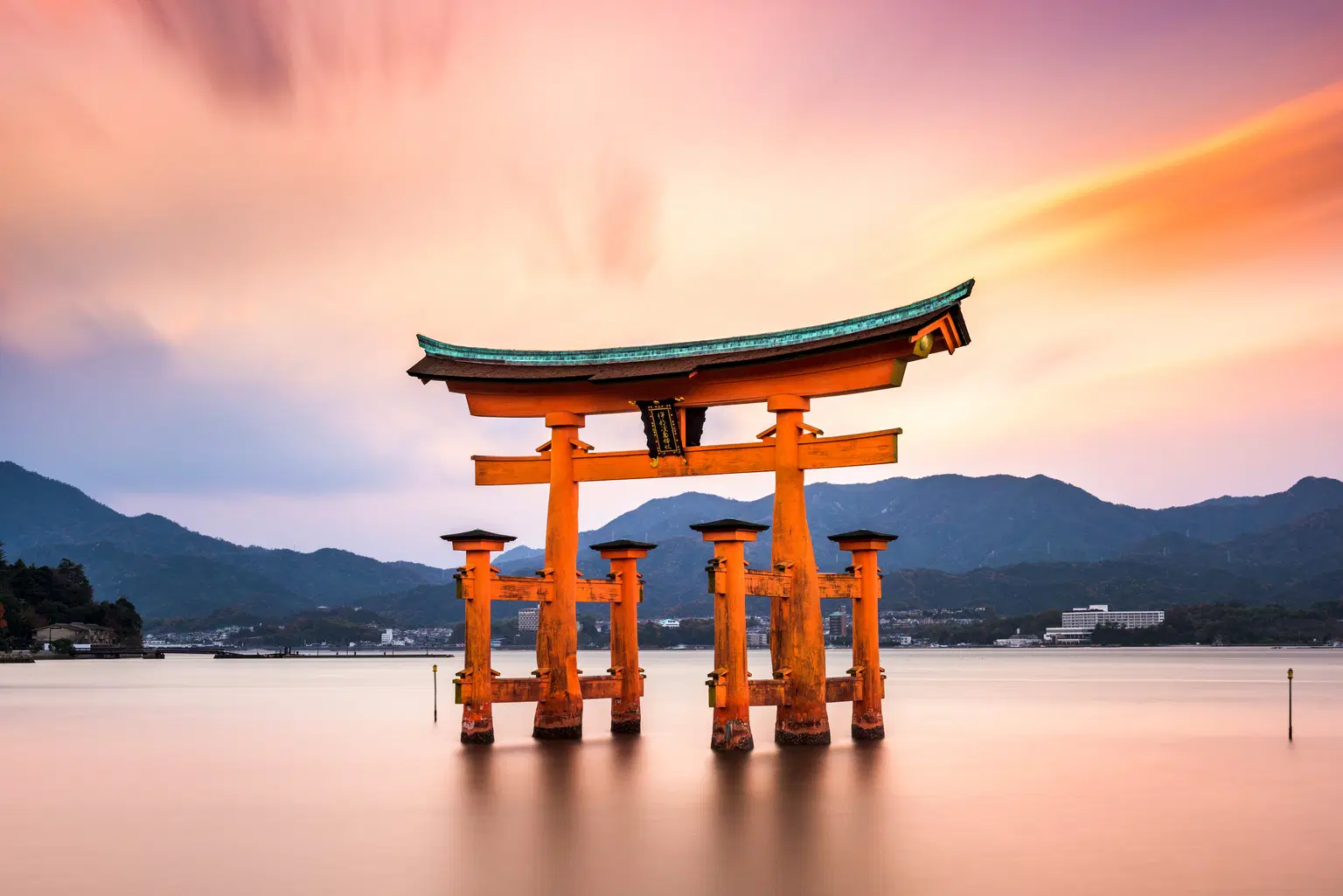 Floating Torii Gate of Itsukushima Shrine at sunset,