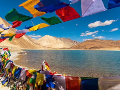 Watch the cotton clouds floating over the tranquil lake of Pangong Tso