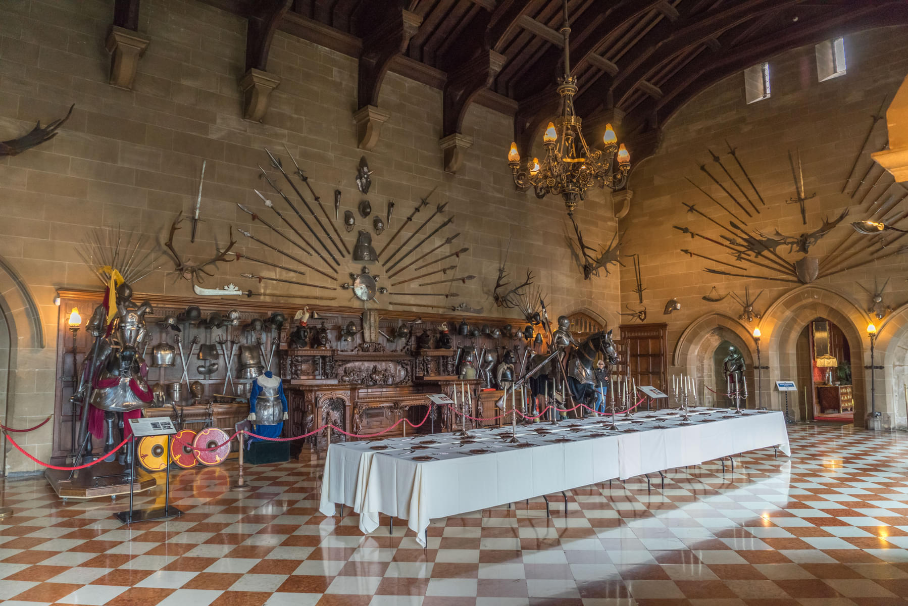 Look at suits of armor and weapons in the Grand Hall