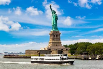 Enjoy a cruise to Statue of Liberty and Ellis Island and snap unforgettable photos of the statue