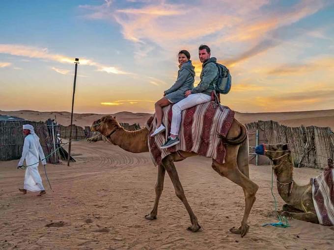 Hop on a camel and cruise in the desert