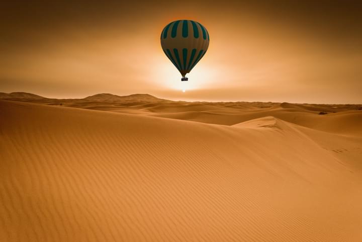 hot air balloon over Dubai desert