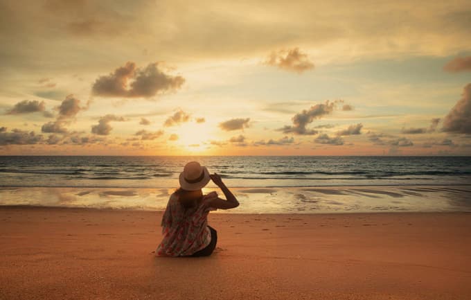 Toruist admiring beach views
