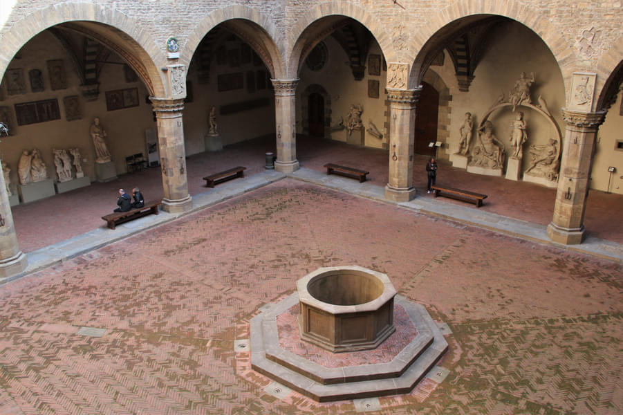 Marvel at various artworks while strolling through the courtyard