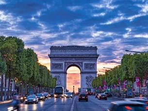 Admire the grandeur of the Arc de Triomphe, standing tall as a symbol of triumph