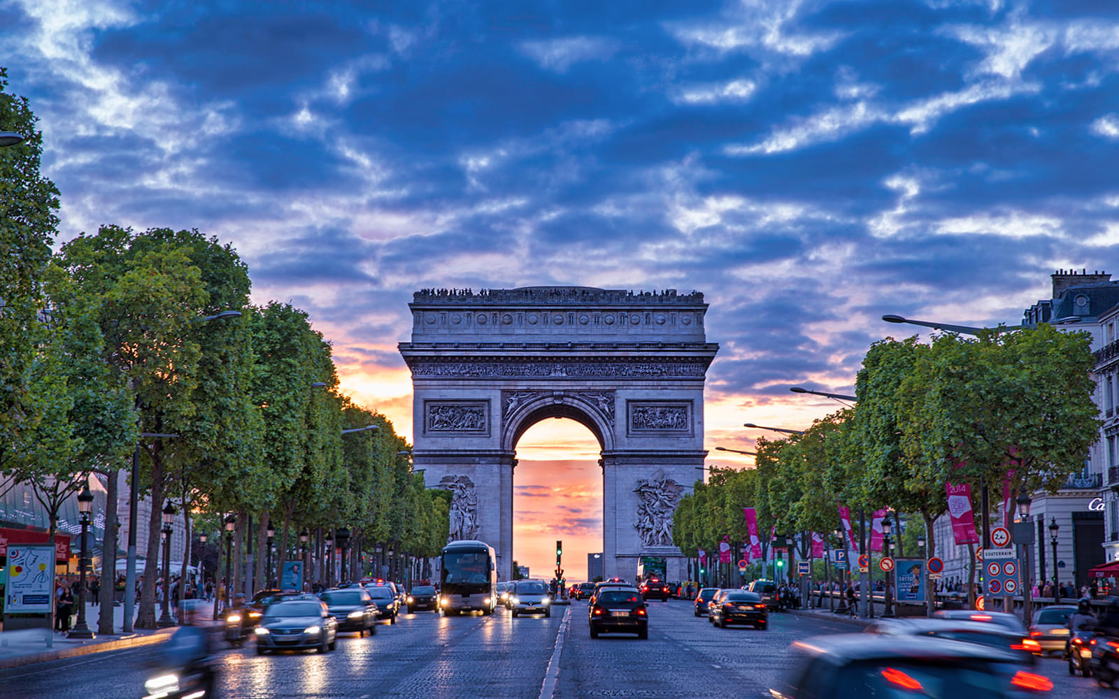 Admire the grandeur of the Arc de Triomphe, standing tall as a symbol of triumph