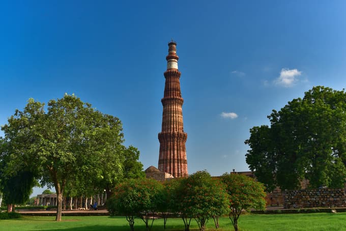 Explore Delhi’s rich heritage and admire the towering Qutub Minar
