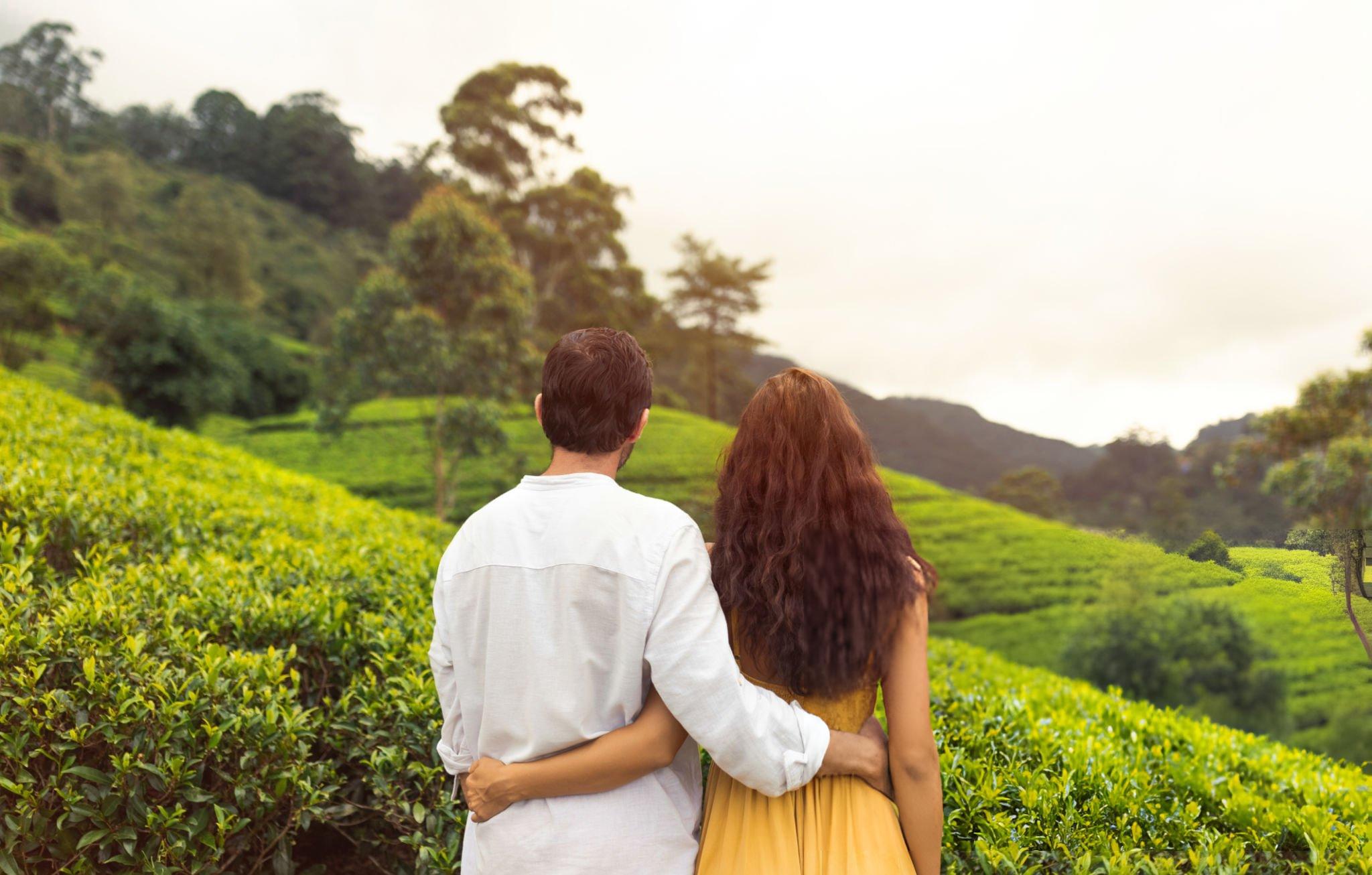 Couple admiring the beauty of Munnar Hills