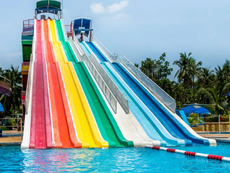 Slide down amazing water slides with your friends