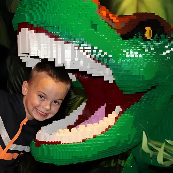 Click quirky pictures with a dinosaur made of Legos