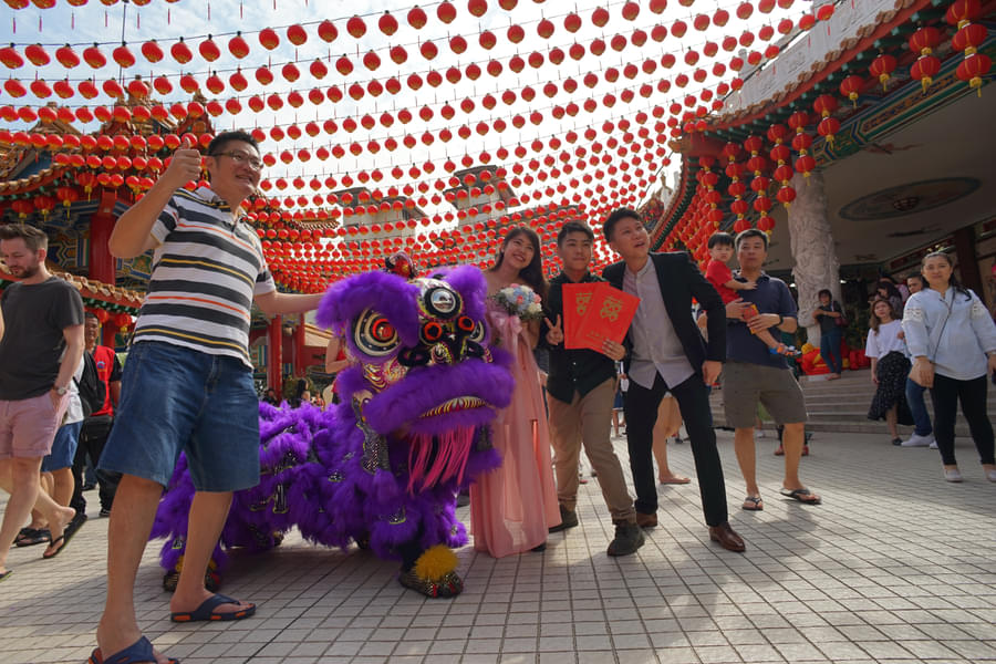 Pose with a Chinese dragon at Thean Hou Temple's enchanting grounds