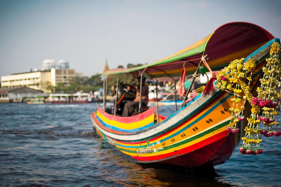 Enjoy a sail on the traditional Long-tail Boat of Bangkok to explore the city
