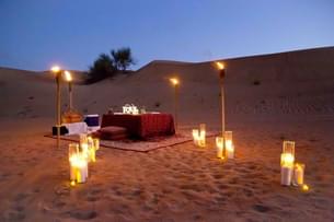 Beautiful dining set up arranged amidst the desert