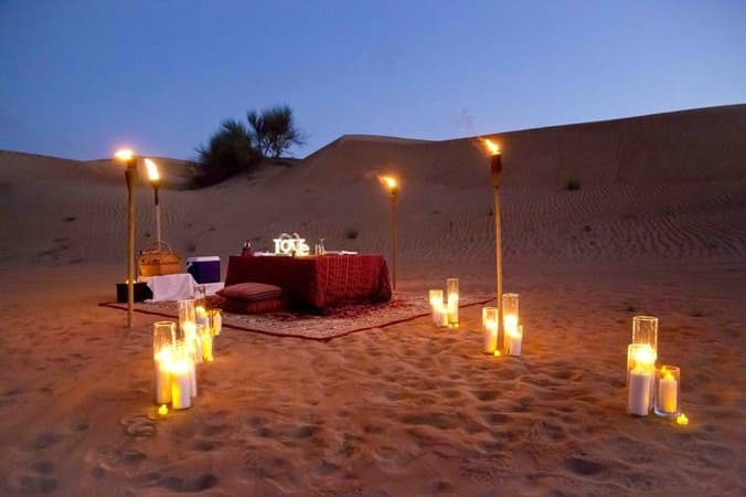 Beautiful dining set up arranged amidst the desert