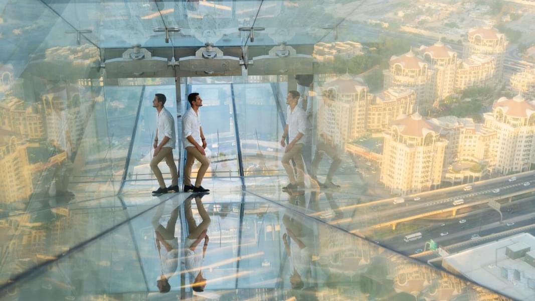 Stroll on the 25-meter-high glass floor of the spectacular Sky Views 