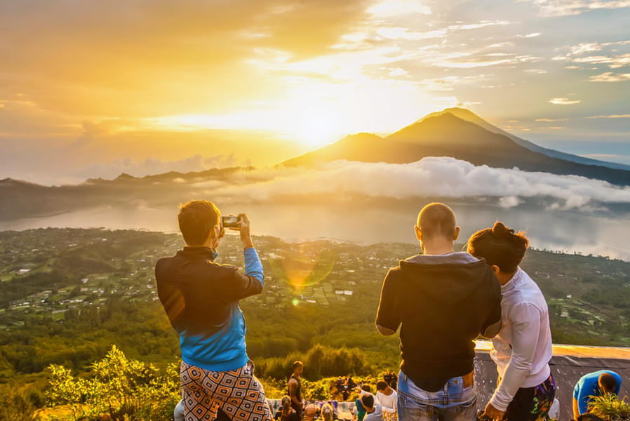 Witness the captivating sunrise over Mount Batur, a moment of pure magic