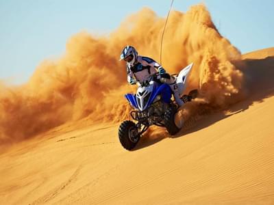 Create a sand storm of your own with your quad bike