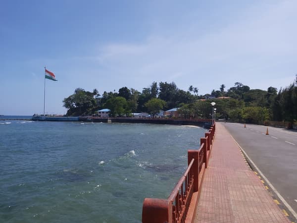 Stroll along serene paths at Flag Point, famous for Netaji's historic 1943 flag hoisting