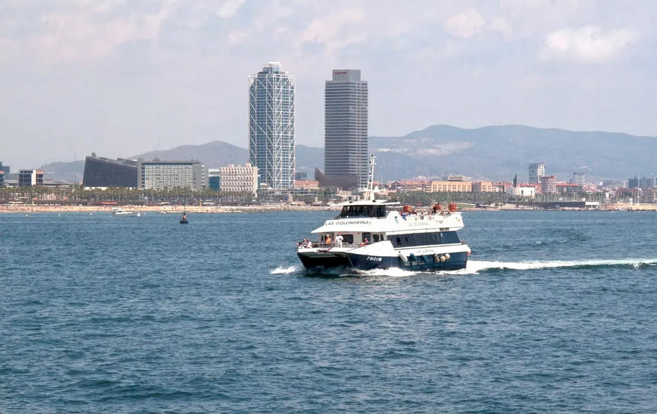 Enjoy the comfortable boat ride sailing across the coasts of Barcelona