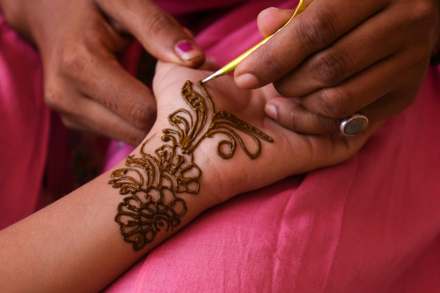 Cooking Classes in Bishnoi Village with Heena Painting Session Image